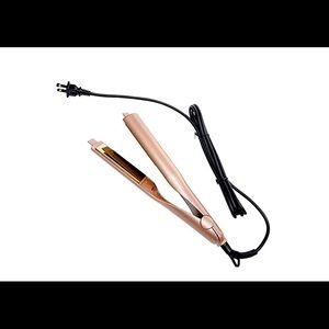 Revolution Twist straightener iron a rose gold gold plate